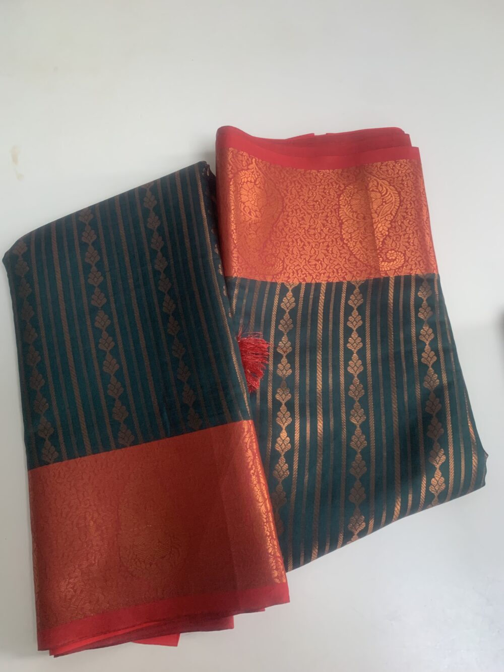 Silk saree in dark green with contrast border and blouse piece in red - Image 3