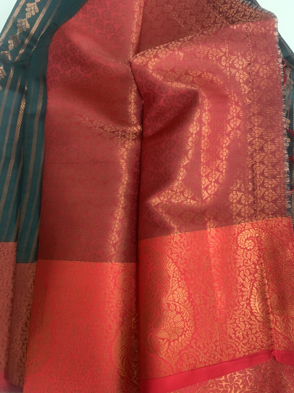 Silk saree in dark green with contrast border and blouse piece in red - Image 6